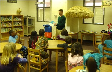 Michael reading Green Eggs and Ham to 4th graders at Tallassee Elementary