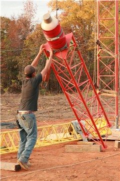The top section of the tower with beacon attached